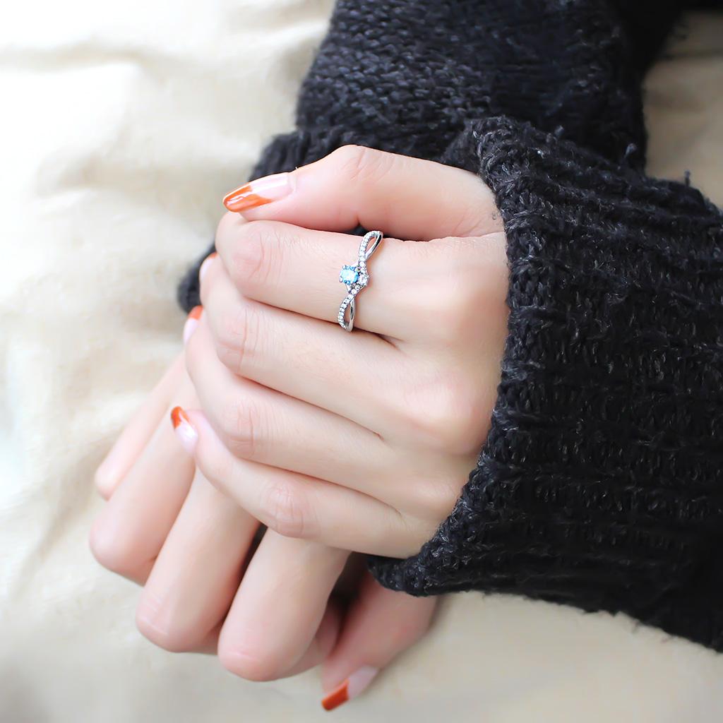 DA120 - High polished (no plating) Stainless Steel Ring with AAA Grade CZ in Sea Blue