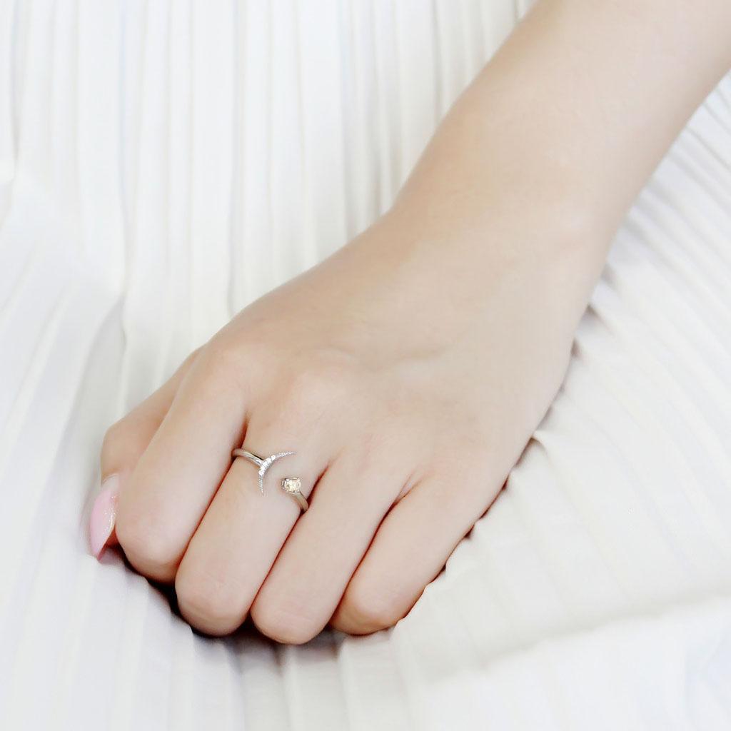 DA358 - High polished (no plating) Stainless Steel Ring with AAA Grade CZ in Champagne